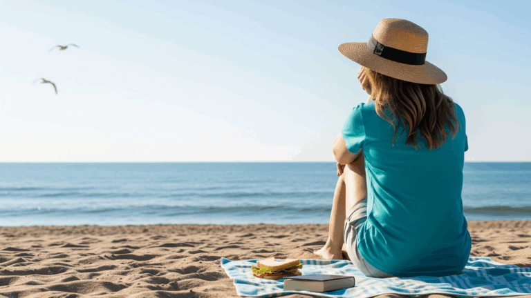 Person bored on a beach vacation, looking out to sea. ADHD travel tips