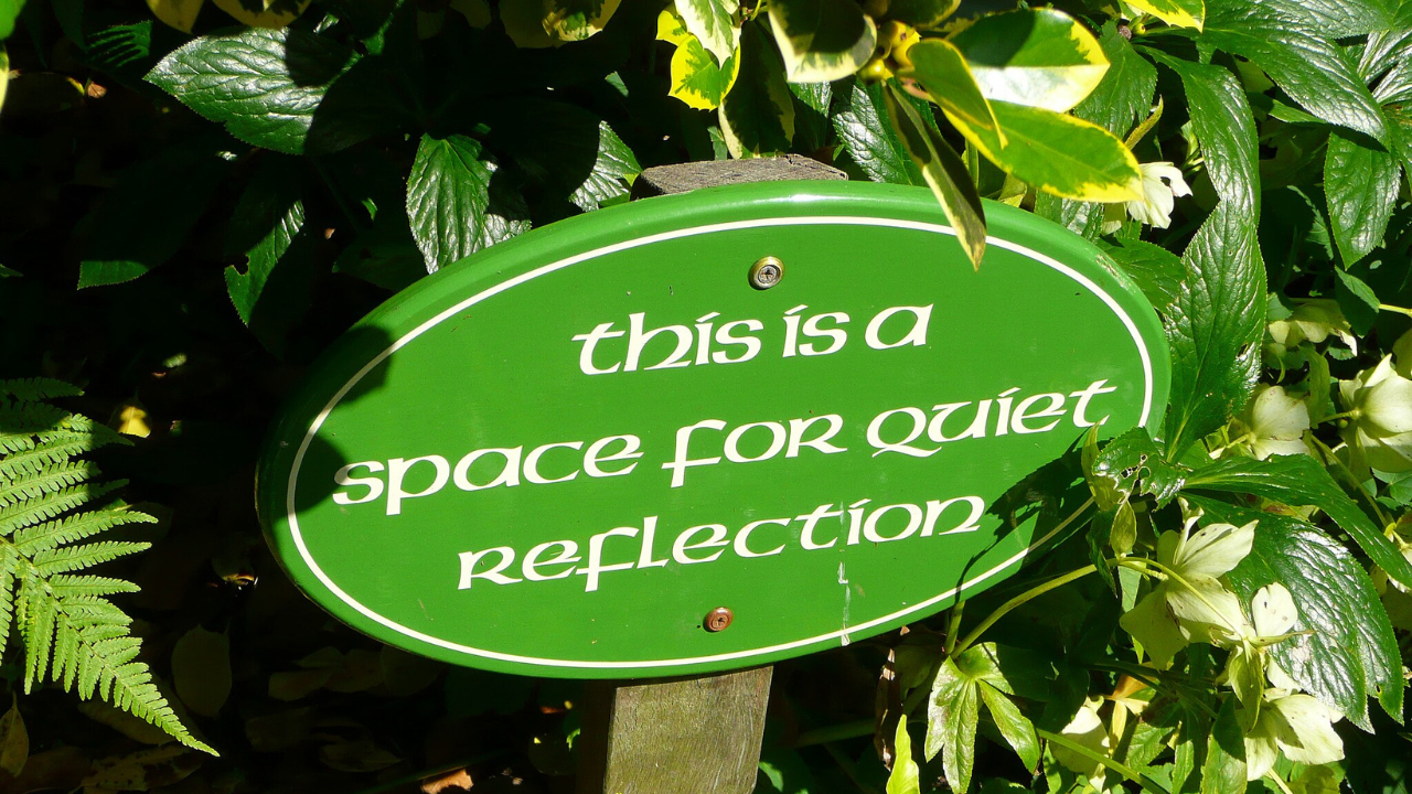 a sign that says "this is a space for quiet reflection"
