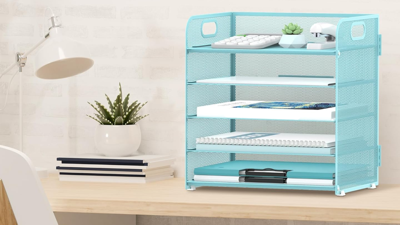 Light blue 5-tray mesh paper organizer with handle, used for sorting documents on an office, home, or school desk.
